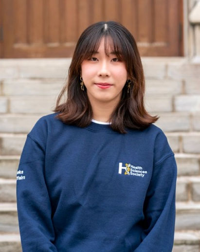 A photo of Betty. She is a young Asian woman and is smiling.