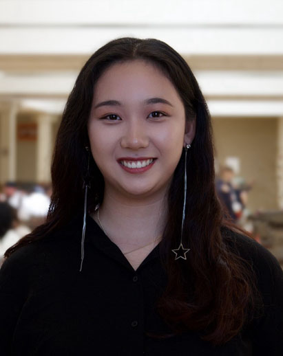 A photo of Tongyan. She is a young Asian woman and is smiling.