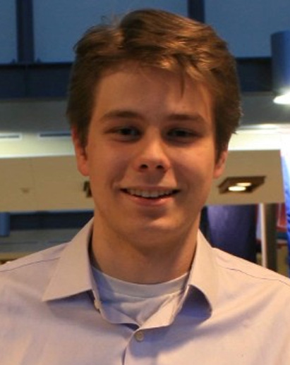 A photo of Michael. He is a young white man, smiling and wearing sunlasses.