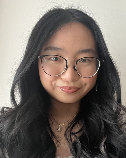 A photo of Sophia. She is a young Asian woman and is smiling.